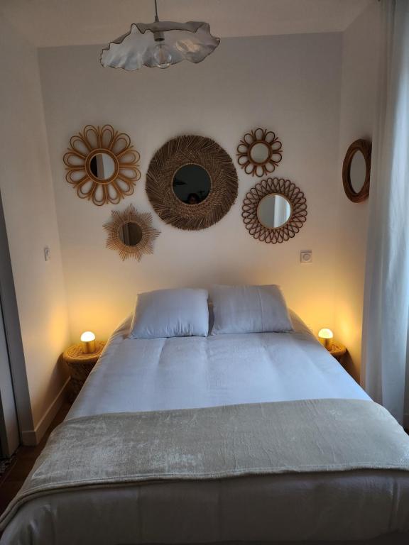 A bed or beds in a room at La maisonnette des hautes granges