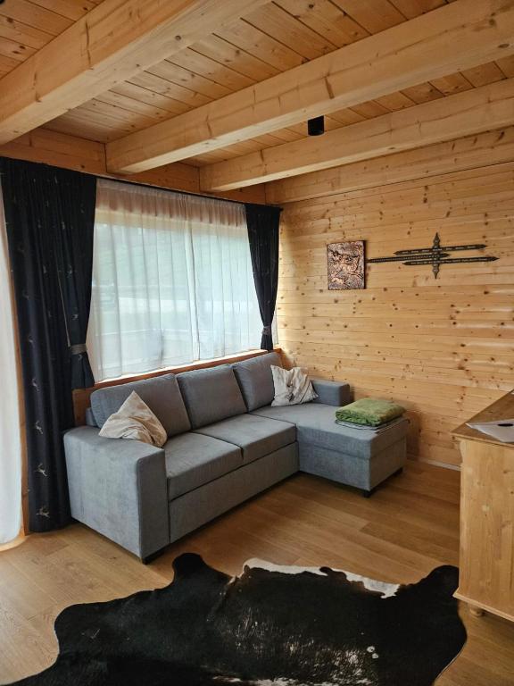 Posezení v ubytování Almchalet Hüttenzauber