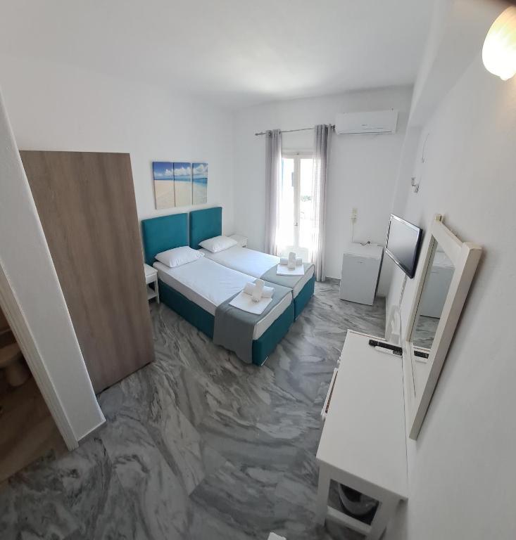 Postel nebo postele na pokoji v ubytování Oceanis Resort