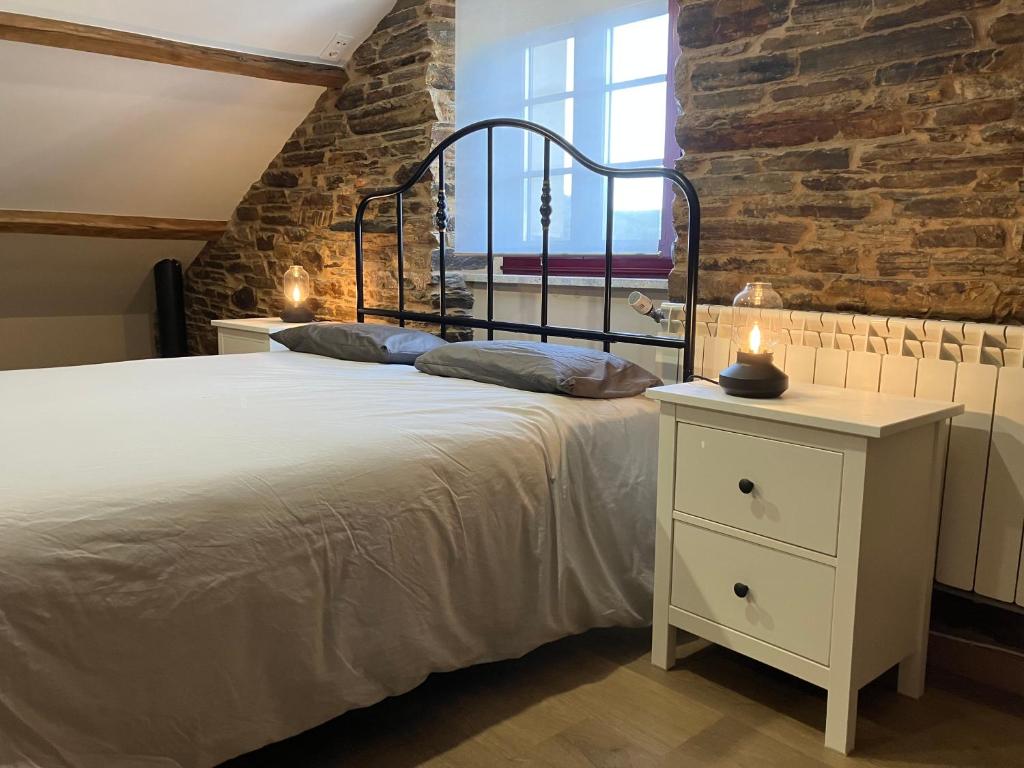 Postel nebo postele na pokoji v ubytování A Casa da Fonte