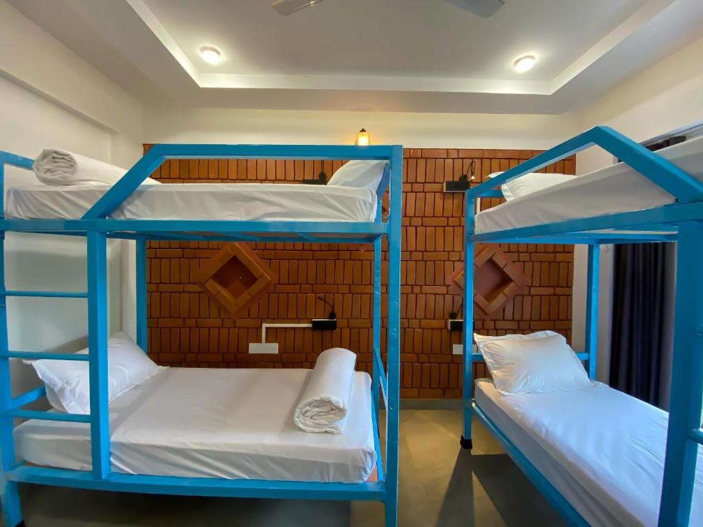 Postel nebo postele na pokoji v ubytování DownTown Hostels - Anjuna