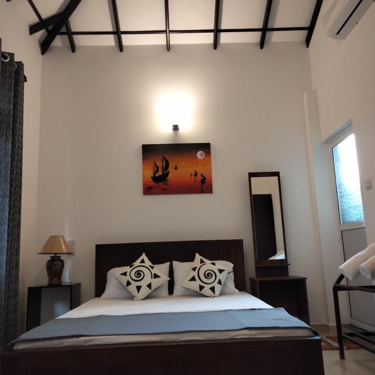Postel nebo postele na pokoji v ubytování R & R Home Stay