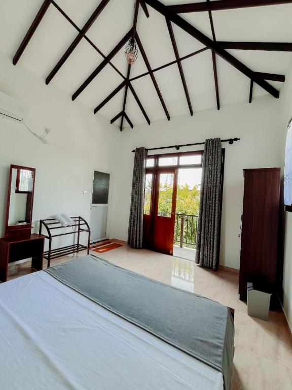 Postel nebo postele na pokoji v ubytování R & R Home Stay