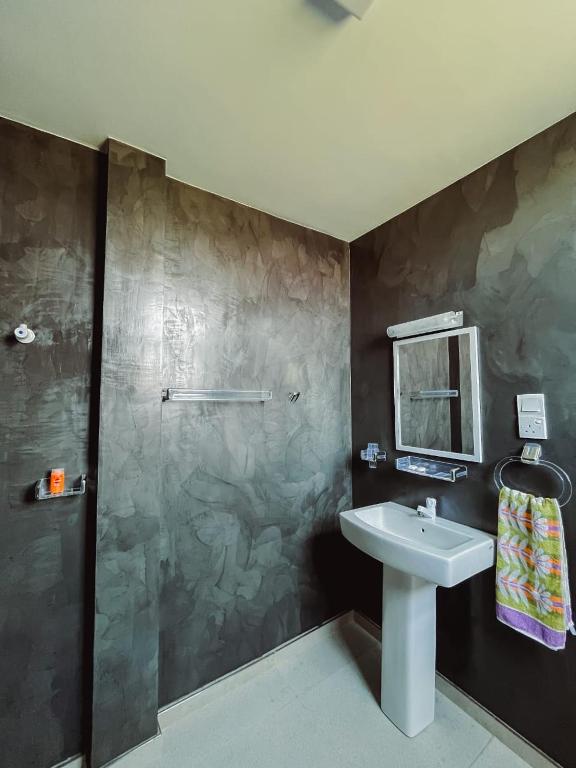 Koupelna v ubytování R & R Home Stay