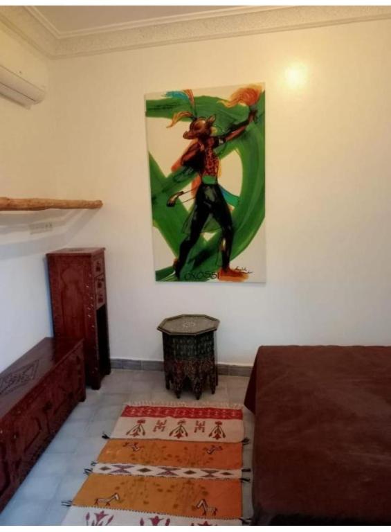 Postel nebo postele na pokoji v ubytování Riad EL BADI