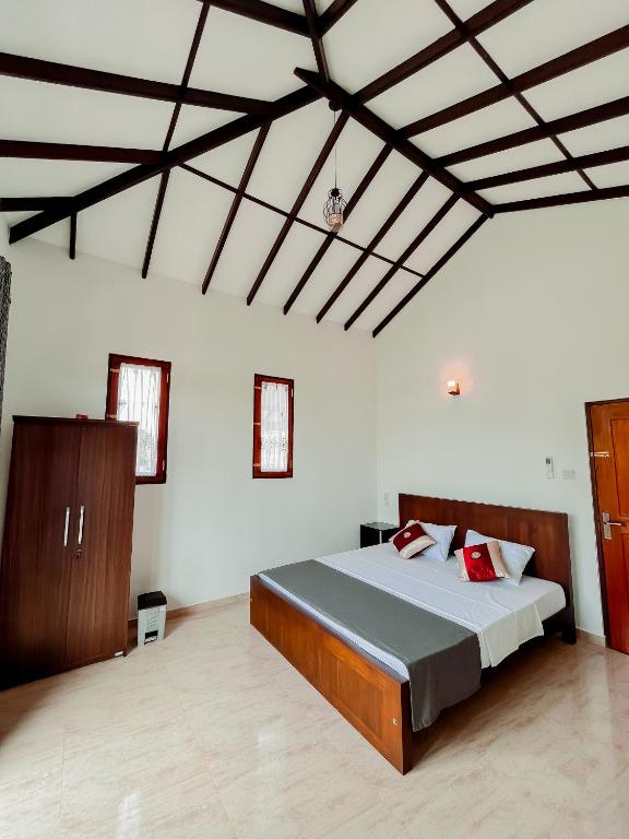 Postel nebo postele na pokoji v ubytování R & R Home Stay