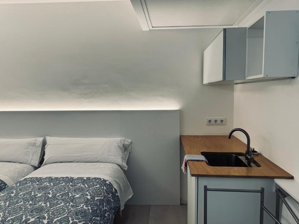 Kuchyň nebo kuchyňský kout v ubytování Hostal Marina Cadaqués