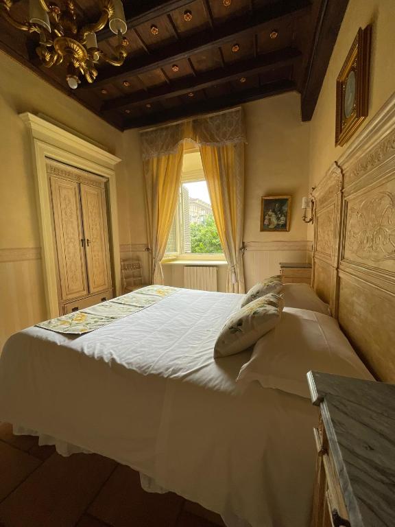 Postel nebo postele na pokoji v ubytování Ai Savoia B&B - Guest House