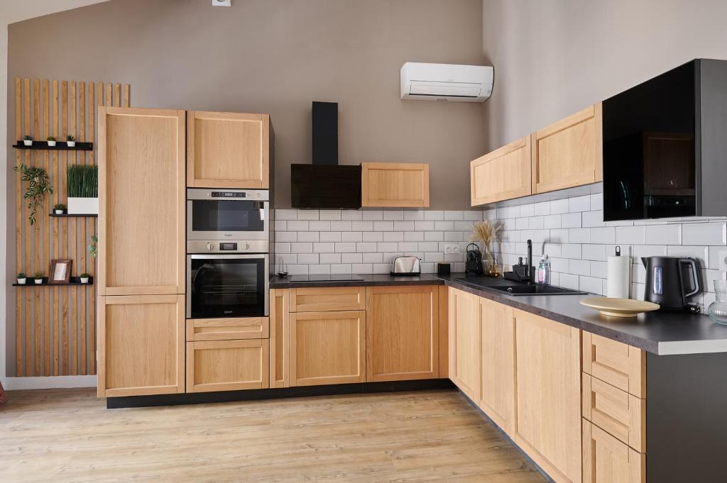 Kuchyň nebo kuchyňský kout v ubytování Le Flourens by Paul Riquet 1609 Residences
