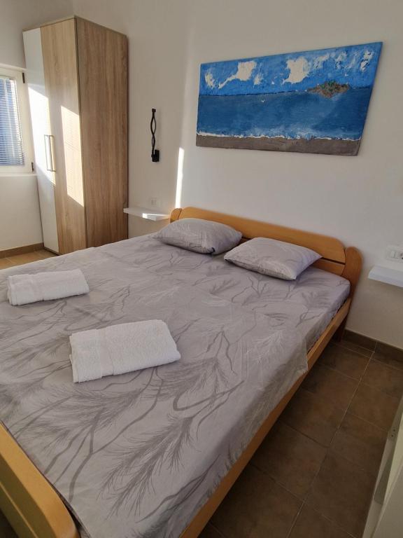 Postel nebo postele na pokoji v ubytování Chill zone houses Katun Reževići