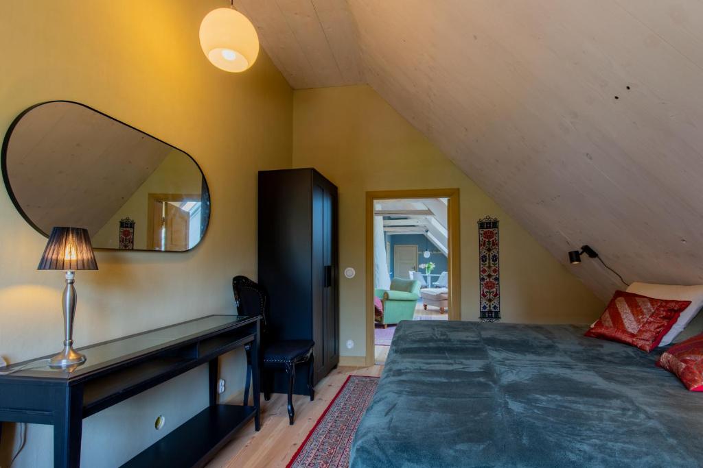 Postel nebo postele na pokoji v ubytování Ängaröds Gård