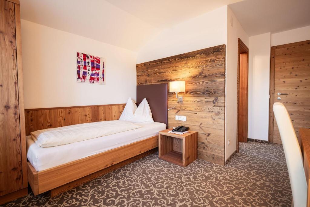 Postel nebo postele na pokoji v ubytování Garni Jasmin