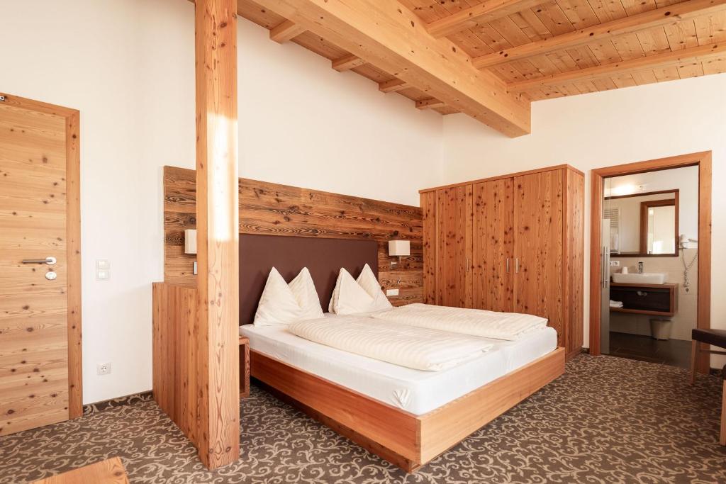 Postel nebo postele na pokoji v ubytování Garni Jasmin
