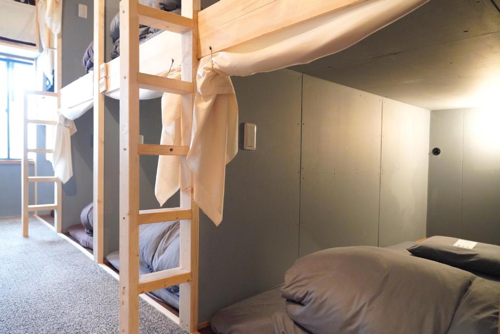 Postel nebo postele na pokoji v ubytování Minka House