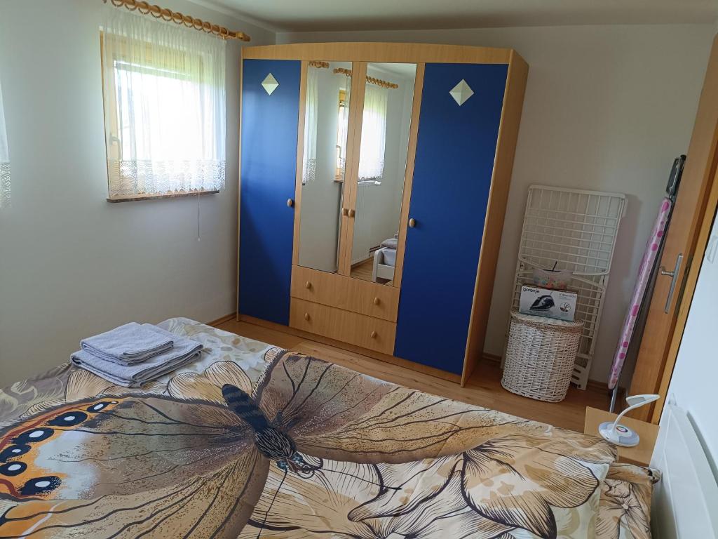 Postel nebo postele na pokoji v ubytování Hiška na gorci