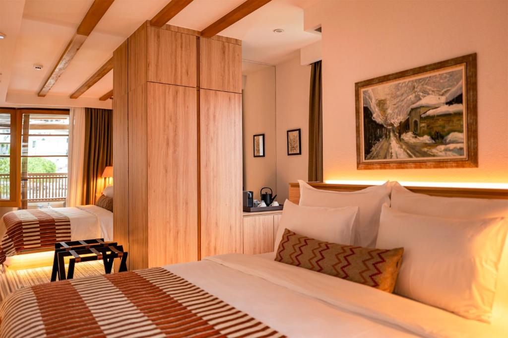 Postel nebo postele na pokoji v ubytování Hotel Baškuća Sarajevo