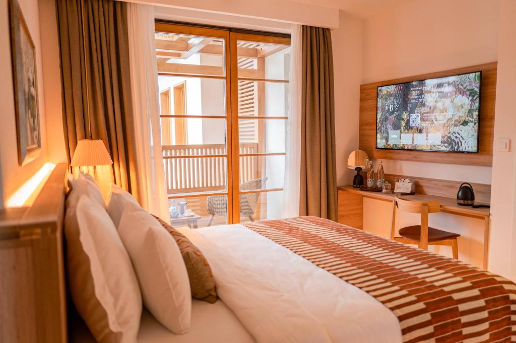 TV a/nebo společenská místnost v ubytování Hotel Baškuća Sarajevo