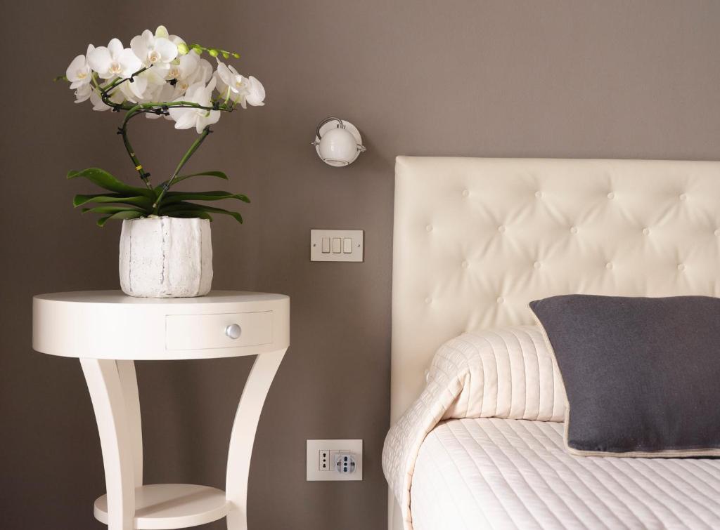 Postel nebo postele na pokoji v ubytování Hotel Sole