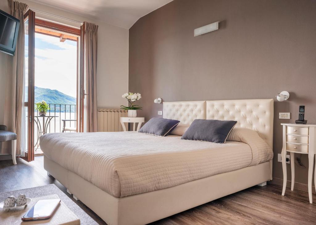Postel nebo postele na pokoji v ubytování Hotel Sole