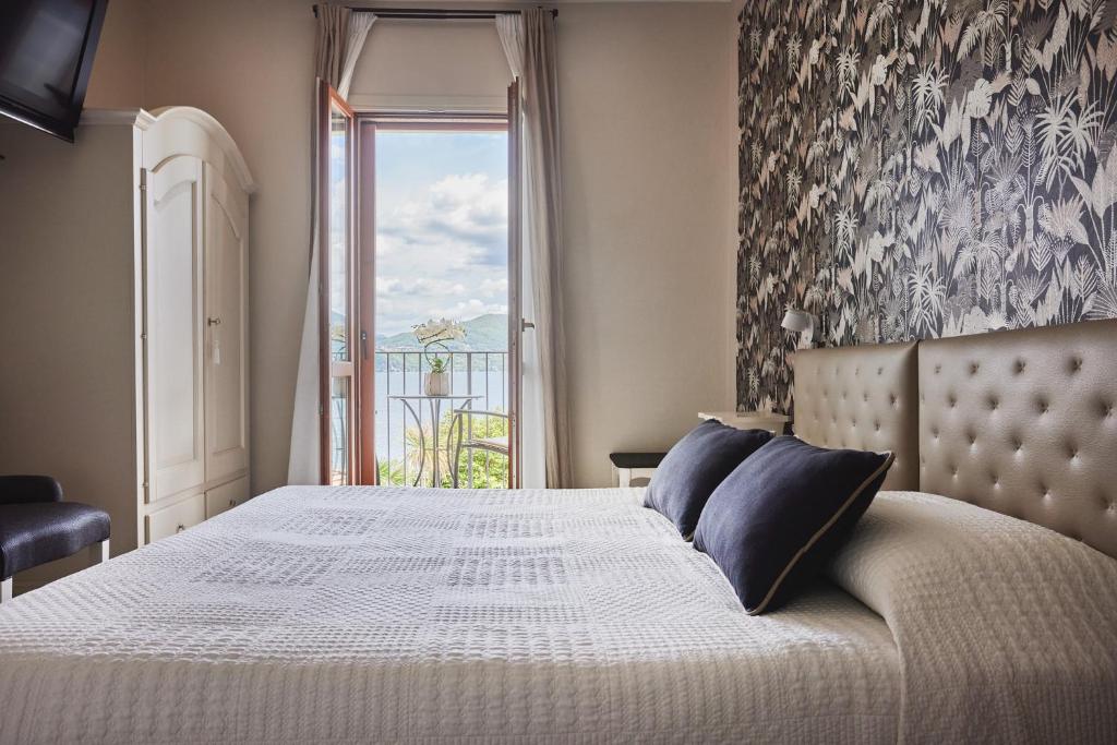 Postel nebo postele na pokoji v ubytování Hotel Sole