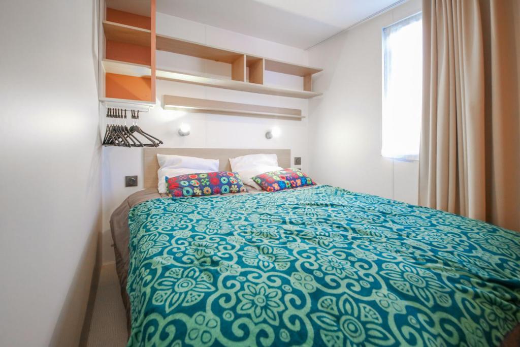 Postel nebo postele na pokoji v ubytování Camping het Wieskamp