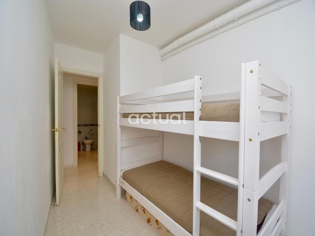 Postel nebo postele na pokoji v ubytování Mar D´Aro Esc 2 Bajos B