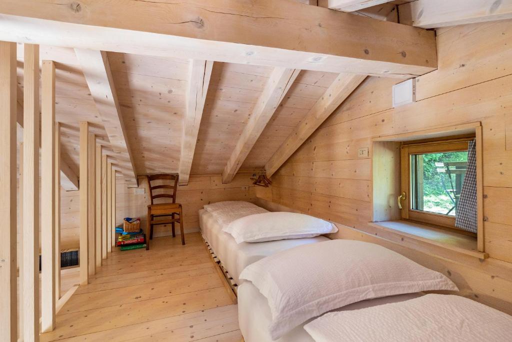 Postel nebo postele na pokoji v ubytování Wunderchalet