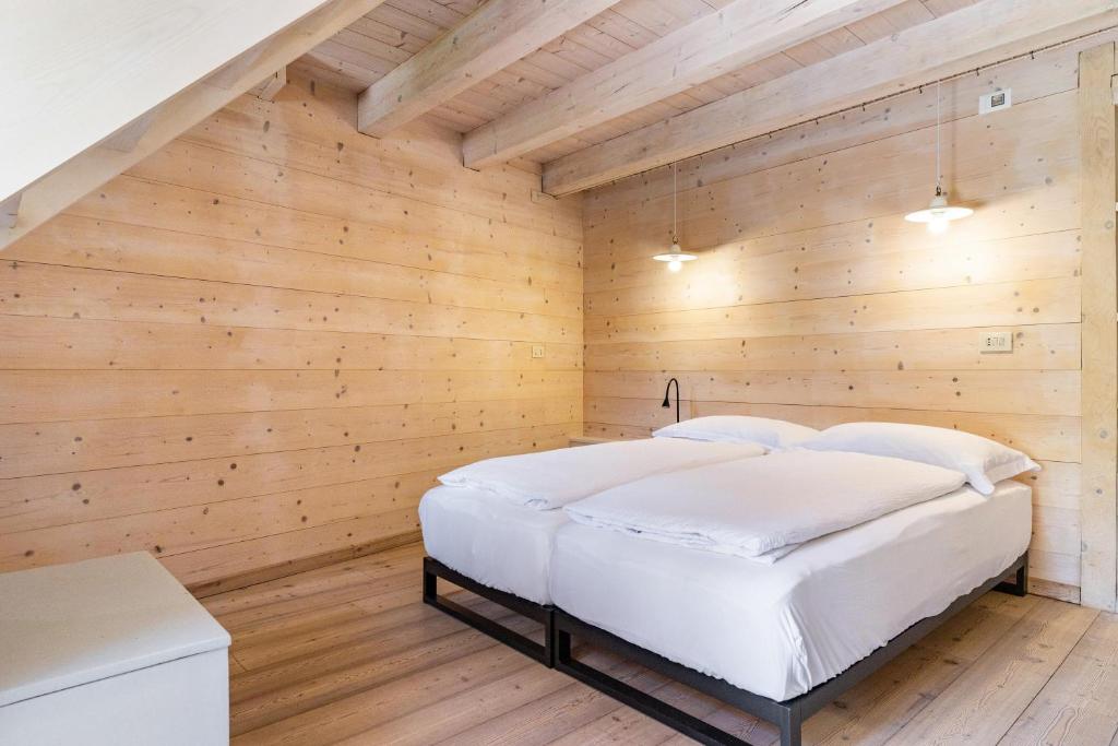 Postel nebo postele na pokoji v ubytování Wunderchalet