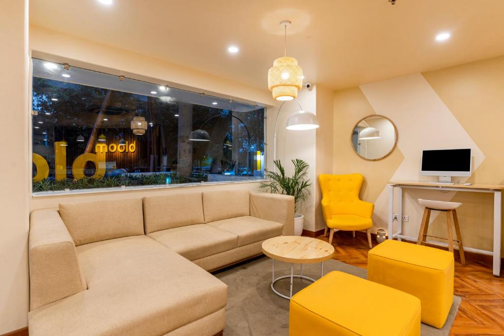 TV a/nebo společenská místnost v ubytování Bloom Hotel - Sector 19