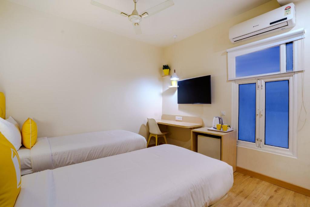 TV a/nebo společenská místnost v ubytování Bloom Hotel - GK2