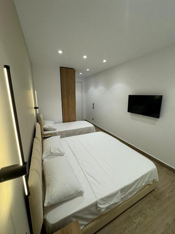 Postel nebo postele na pokoji v ubytování Sea La Vie Hotel