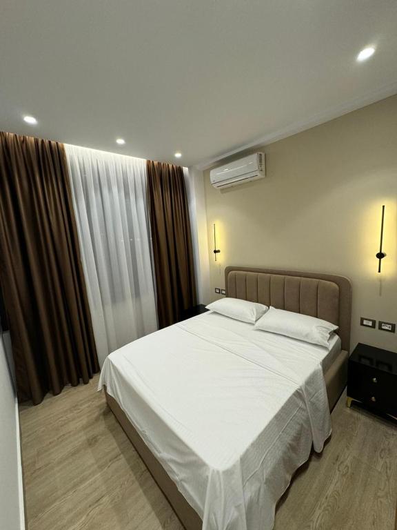 Postel nebo postele na pokoji v ubytování Sea La Vie Hotel