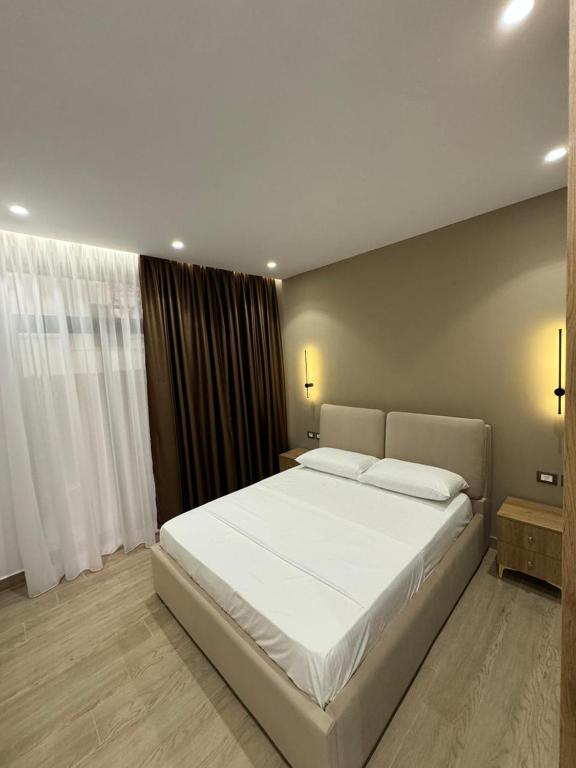 Postel nebo postele na pokoji v ubytování Sea La Vie Hotel