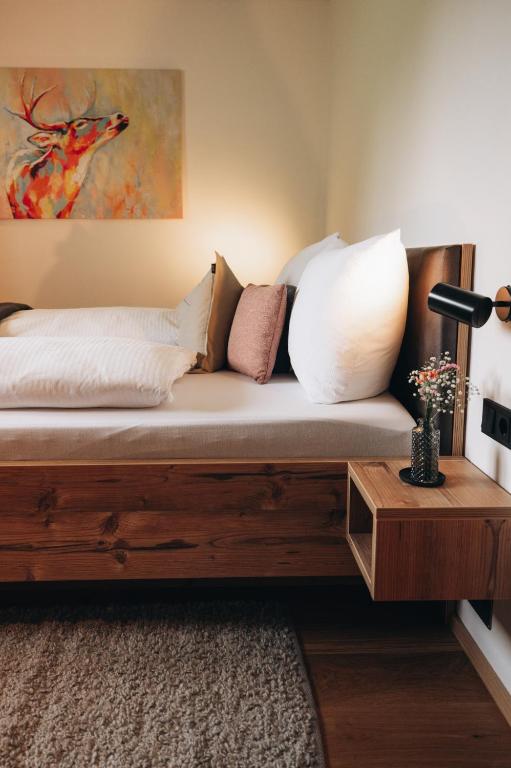 Postel nebo postele na pokoji v ubytování Rosa Alpina Appartement