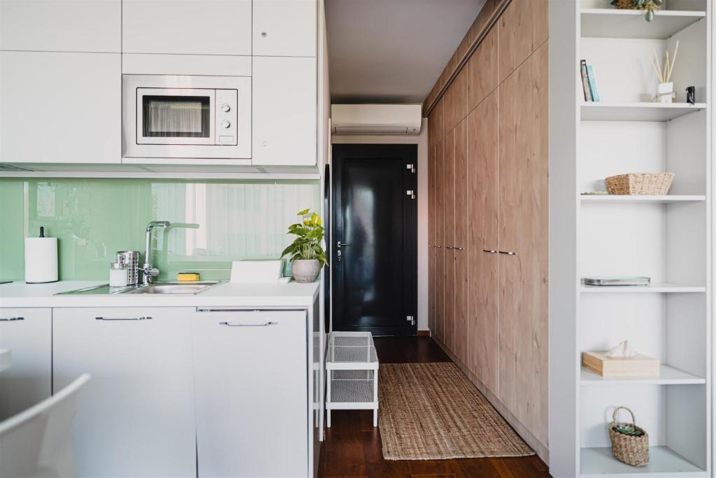 Kuchnia lub aneks kuchenny w obiekcie Butique Apartman Grand