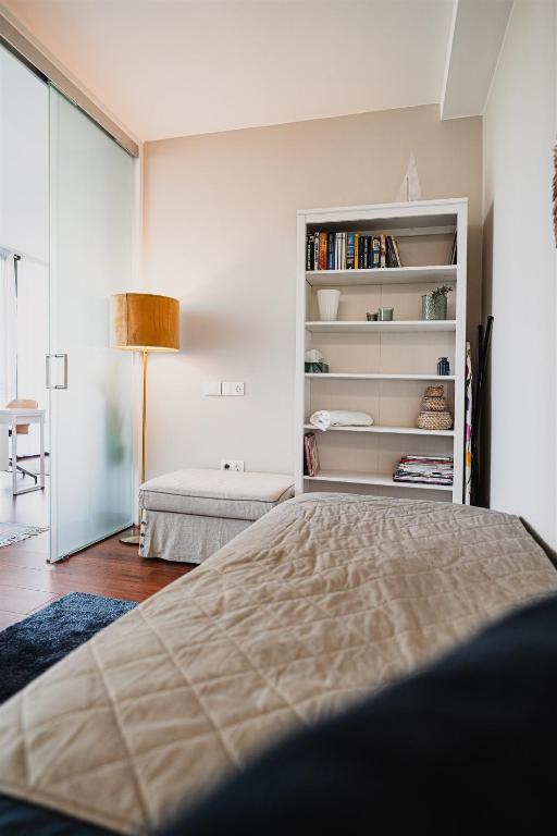 Łóżko lub łóżka w pokoju w obiekcie Butique Apartman Grand