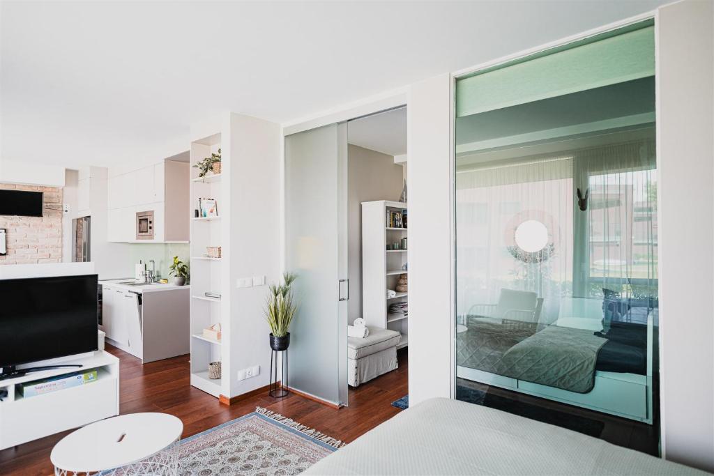 Telewizja i/lub zestaw kina domowego w obiekcie Butique Apartman Grand