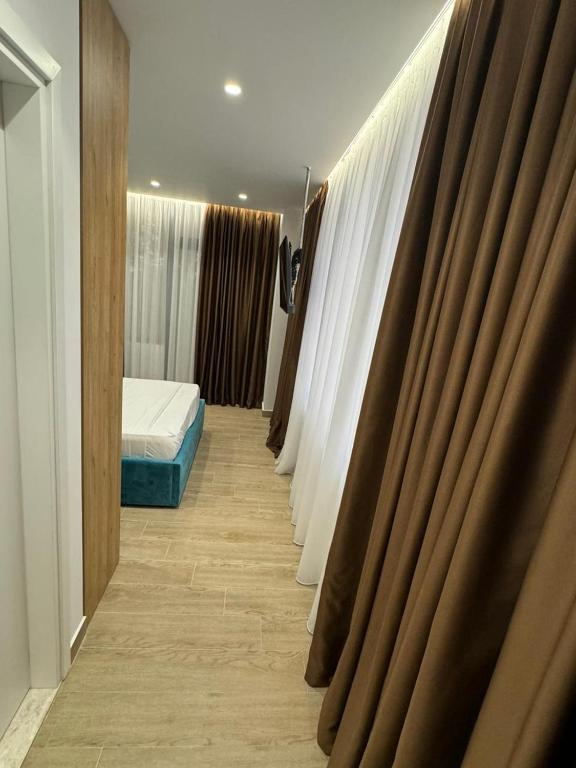Postel nebo postele na pokoji v ubytování Sea La Vie Hotel