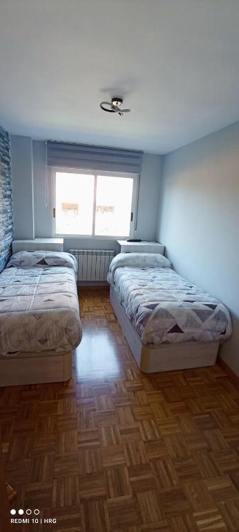Posteľ alebo postele v izbe v ubytovaní La Casita de Hugo