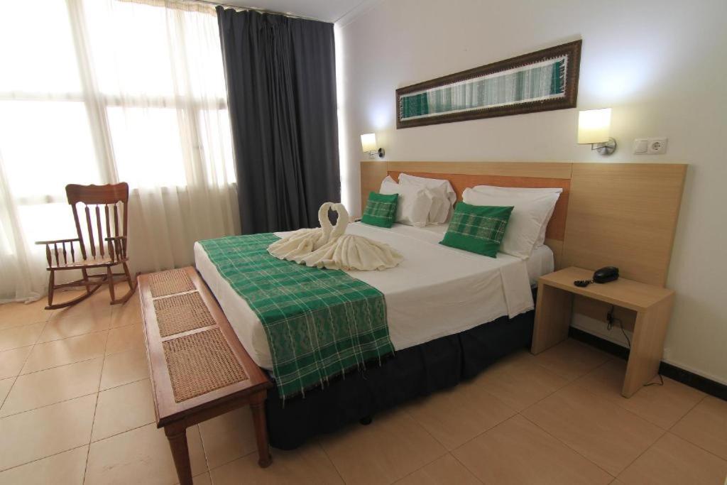 Postel nebo postele na pokoji v ubytování Hotel Santa Maria