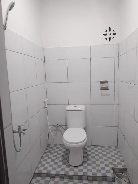 Koupelna v ubytování Eltari Homestay