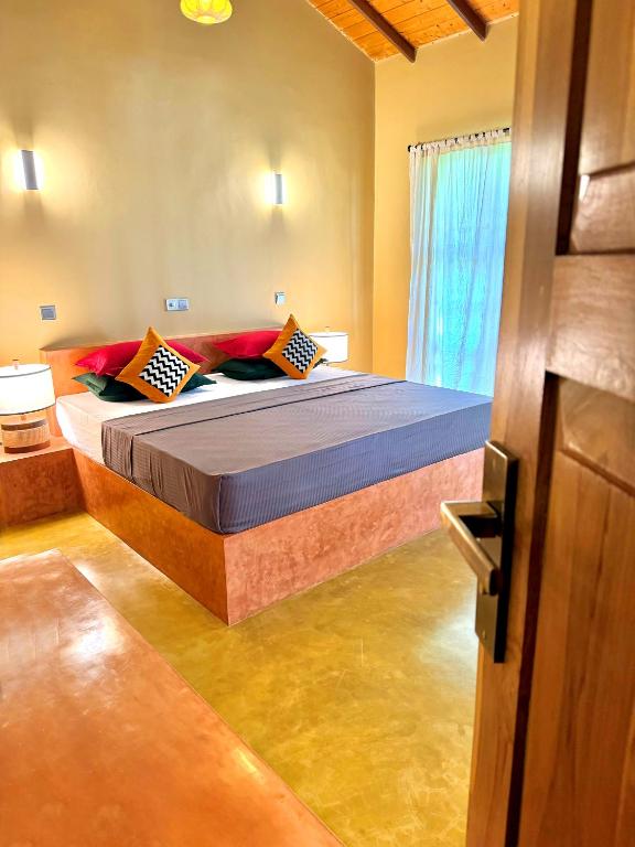 Postel nebo postele na pokoji v ubytování Art Yala Boutique Resort
