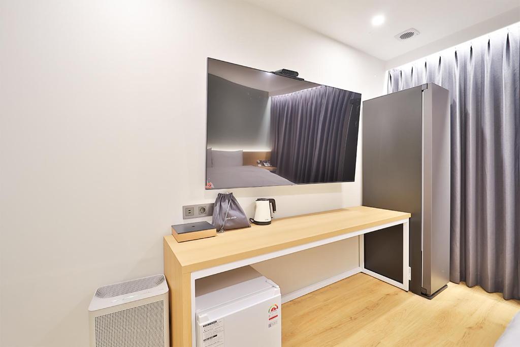 Kuchyň nebo kuchyňský kout v ubytování Gongdam Stay Hotel Ulsan Samsan