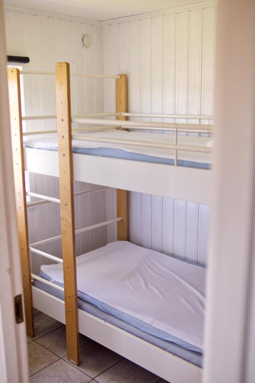 Postel nebo postele na pokoji v ubytování Hälleviks Camping