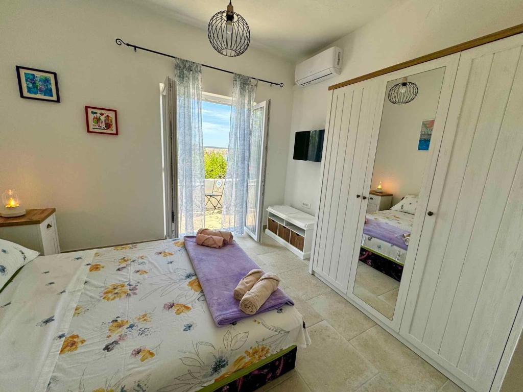 Posteľ alebo postele v izbe v ubytovaní Apartment in Jadranovo 41612