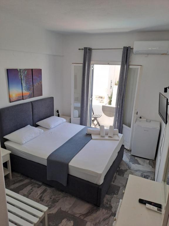 Postel nebo postele na pokoji v ubytování Oceanis Resort