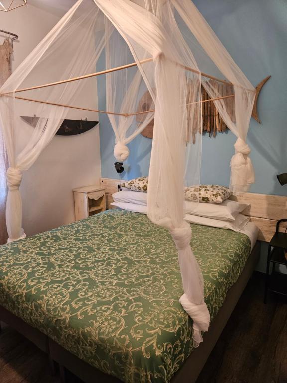 Кровать или кровати в номере VILLA VILLACOLLE
