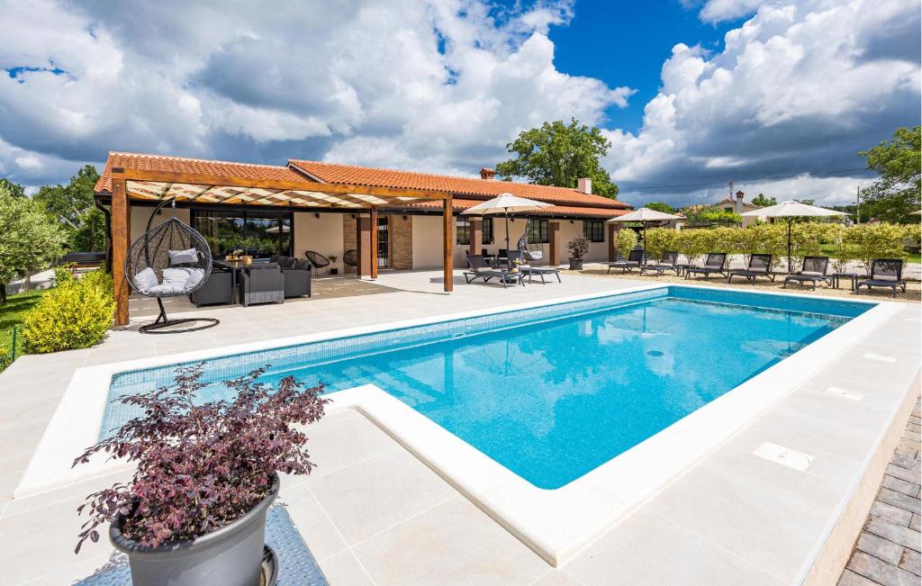 an image of a swimming pool in a house at 4 Bedroom Lovely Home In Labin in Labin