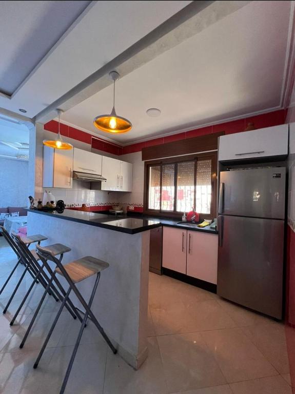 Kuchyň nebo kuchyňský kout v ubytování Charmant appartement bien situé.