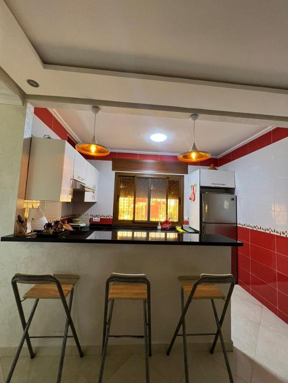 Kuchyň nebo kuchyňský kout v ubytování Charmant appartement bien situé.